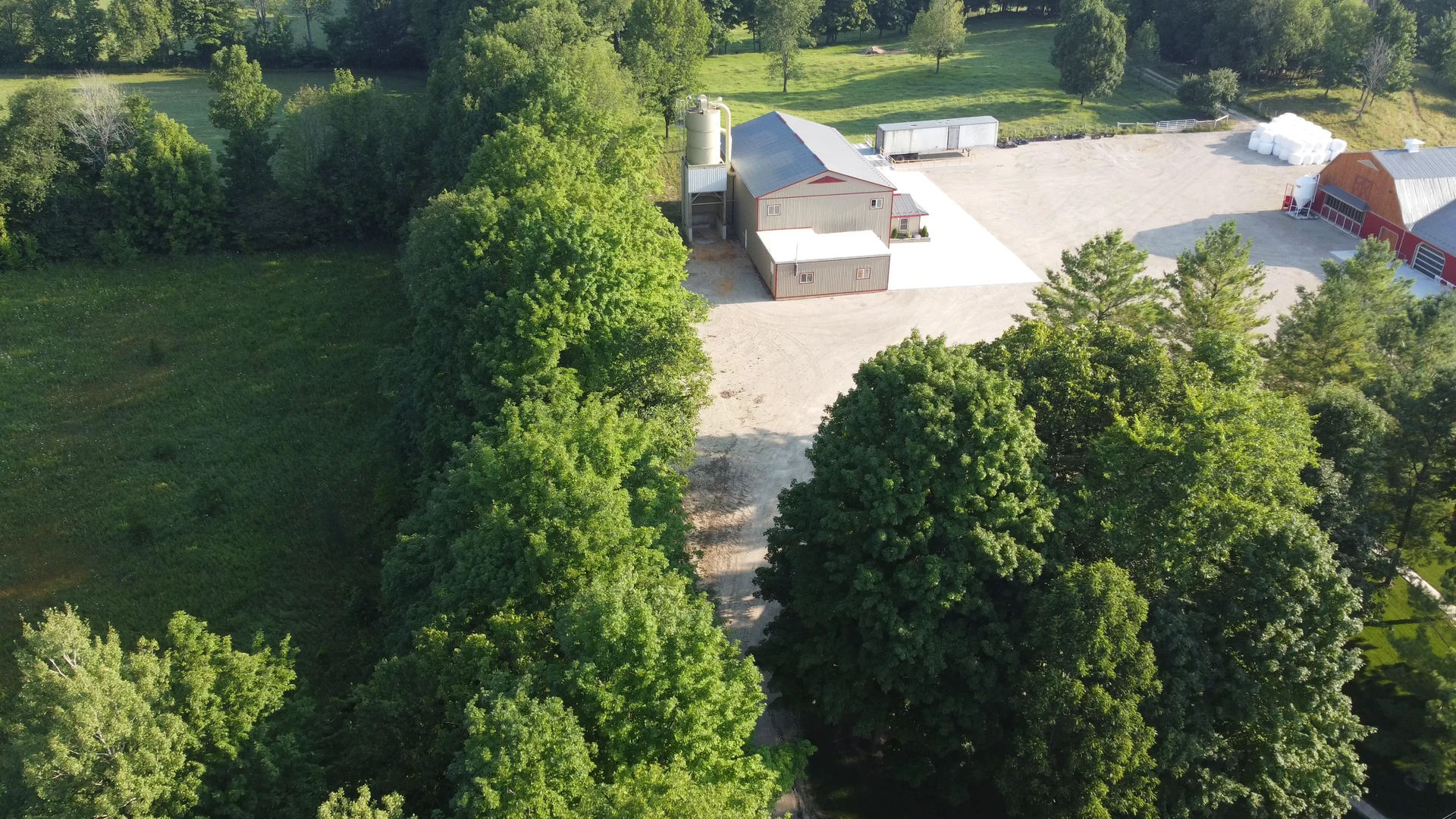 Aerial approach to the real Cedar Hedge Millworks shop in Flesherton